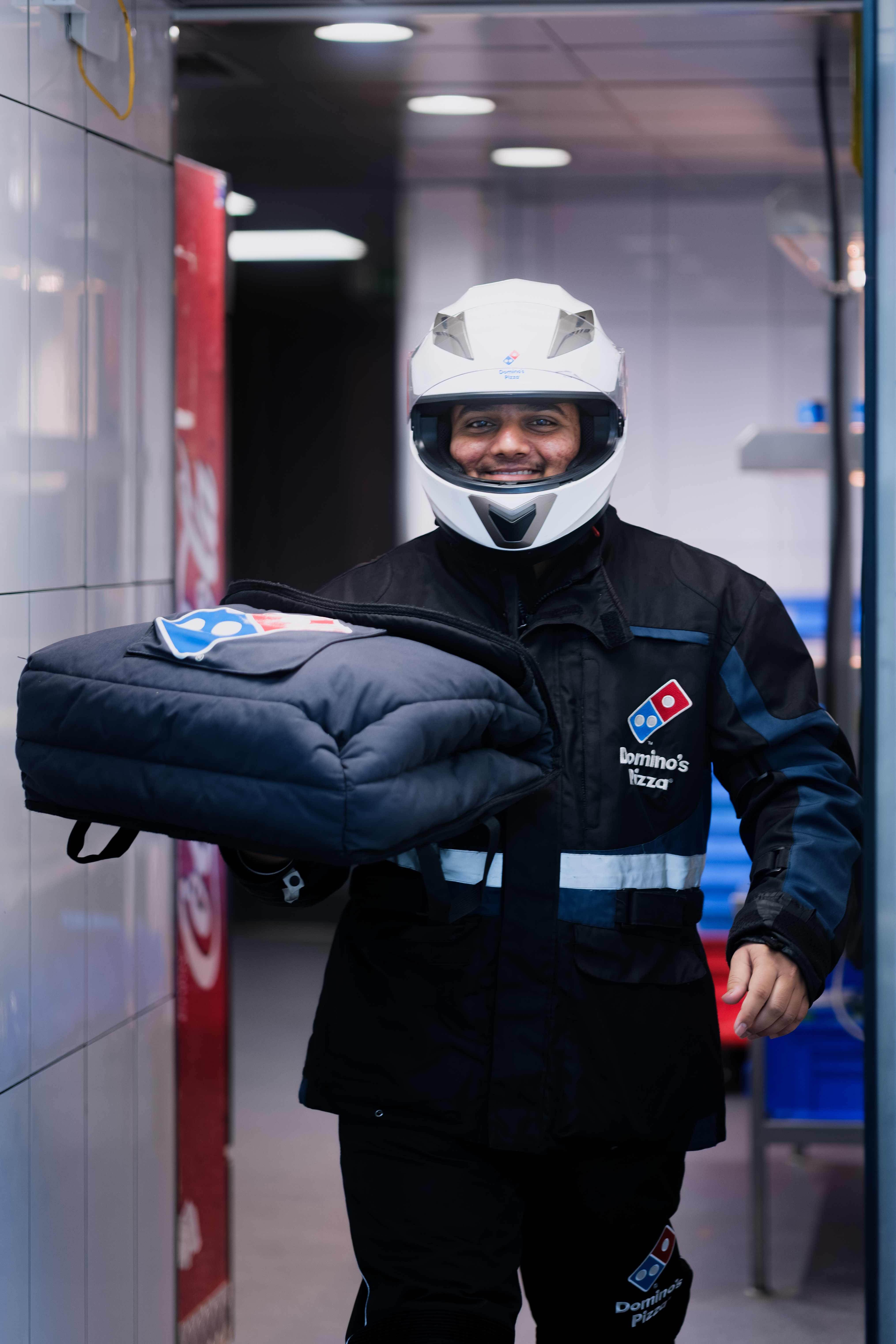 Delivery rider carrying hot bag
